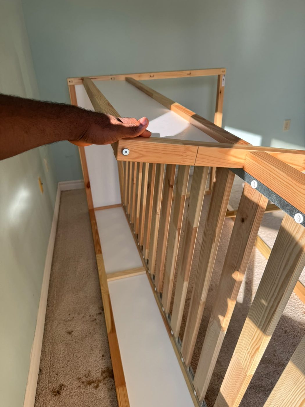 Taking apart an IKEA KURA bed in London Ontario